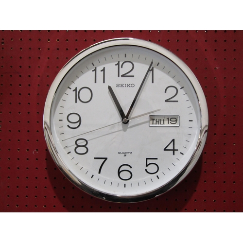 1048 - A Karlsson Denmark, Scandinavian wall clock together with a Seiko quartz wall clock (2)