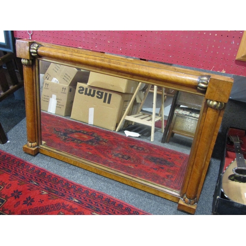 1051 - A maple framed overmantel mirror with gilt border, column form, 59cm x 93cm