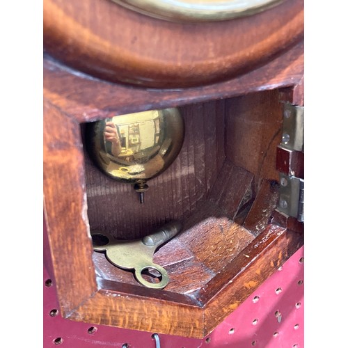 1049 - An early 20th Century HAC miniature drop-dial wall timepiece with glazed lower door, 8-day movement,... 