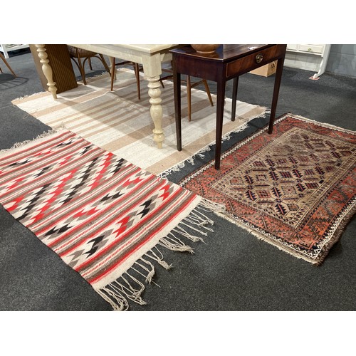 1547 - Three rugs, Eastern red and brown ground geometric design (worn), 140cm x 95cm, American style with ... 