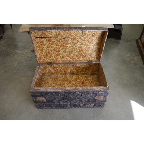 2004 - A 17th Century studded leather trunk dated 1687