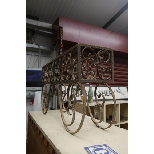 2062 - A scrolled cast iron ornate garden trough planter stand