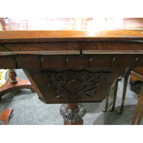 1008 - A William IV rosewood sewing table, lift-up lid revealing fitted interior, blind fretwork decoration... 