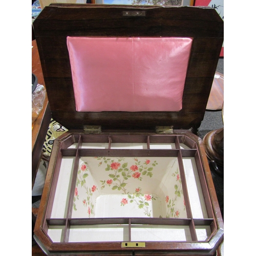 1008 - A William IV rosewood sewing table, lift-up lid revealing fitted interior, blind fretwork decoration... 