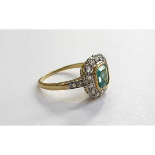 6036 - An emerald and old cut diamond cluster ring, unmarked gold and platinum. Size M, 3.2g