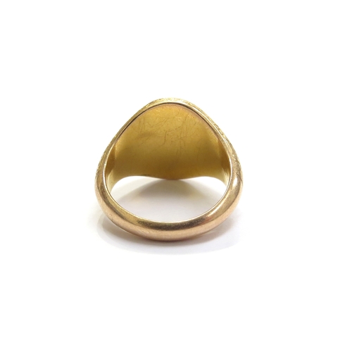 6049 - An 18ct gold bloodstone intaglio signet ring depicting a bird with sprig of foliage in its claw, fin... 