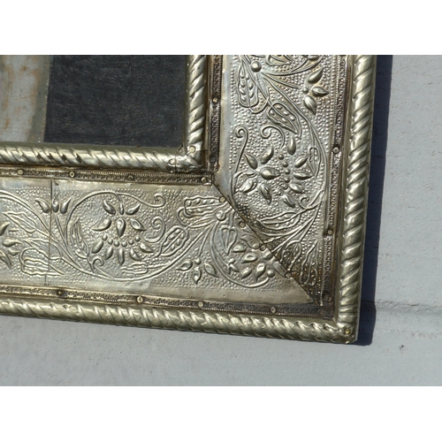 4050 - A 20th Century oil on board of a Tawny Owl, unsigned. Set in an Eastern style white metal covered ar... 