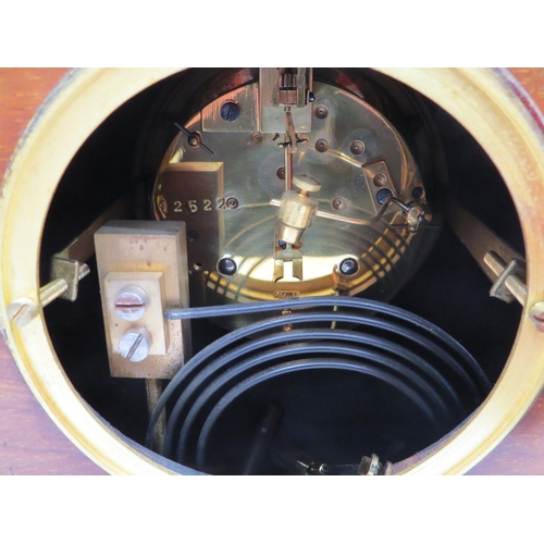 4056 - A French Art Deco mantel clock, inlaid case with stringing detailing, white Arabic dial