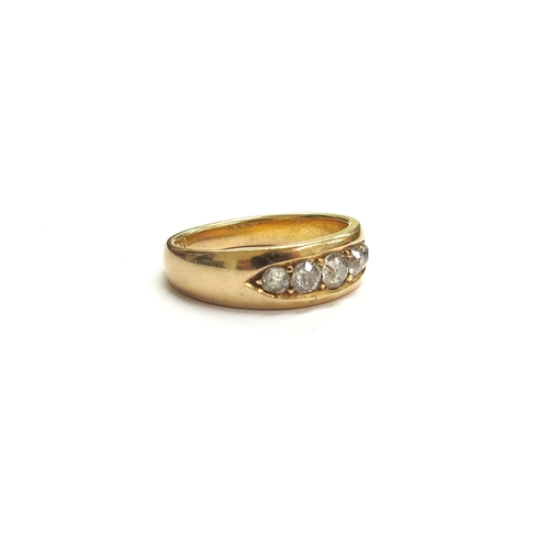 6152 - An 18ct gold ring with five graduated diamonds in boat shaped mount, Chester hallmarks. Size O, 5.6g
