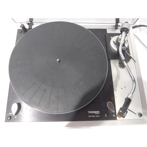 A Thorens TD 160 mk.II turntable, fitted with Linn Basik LV V tonearm ...