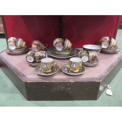 4004 - A Noritake part tea set and six Oriental cups and saucers with character marks to base, one cup a/f