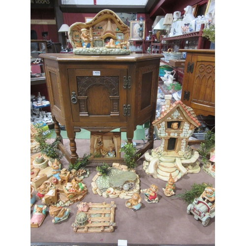 4005 - A large quantity of Pendelfin figures and settings including various stands, large house etc.