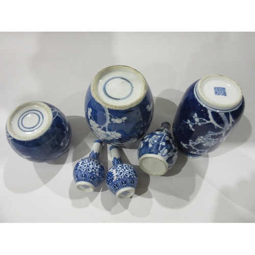 4029 - A selection of Oriental blue and white ceramics including ginger jars (lacking covers) and vases, so... 