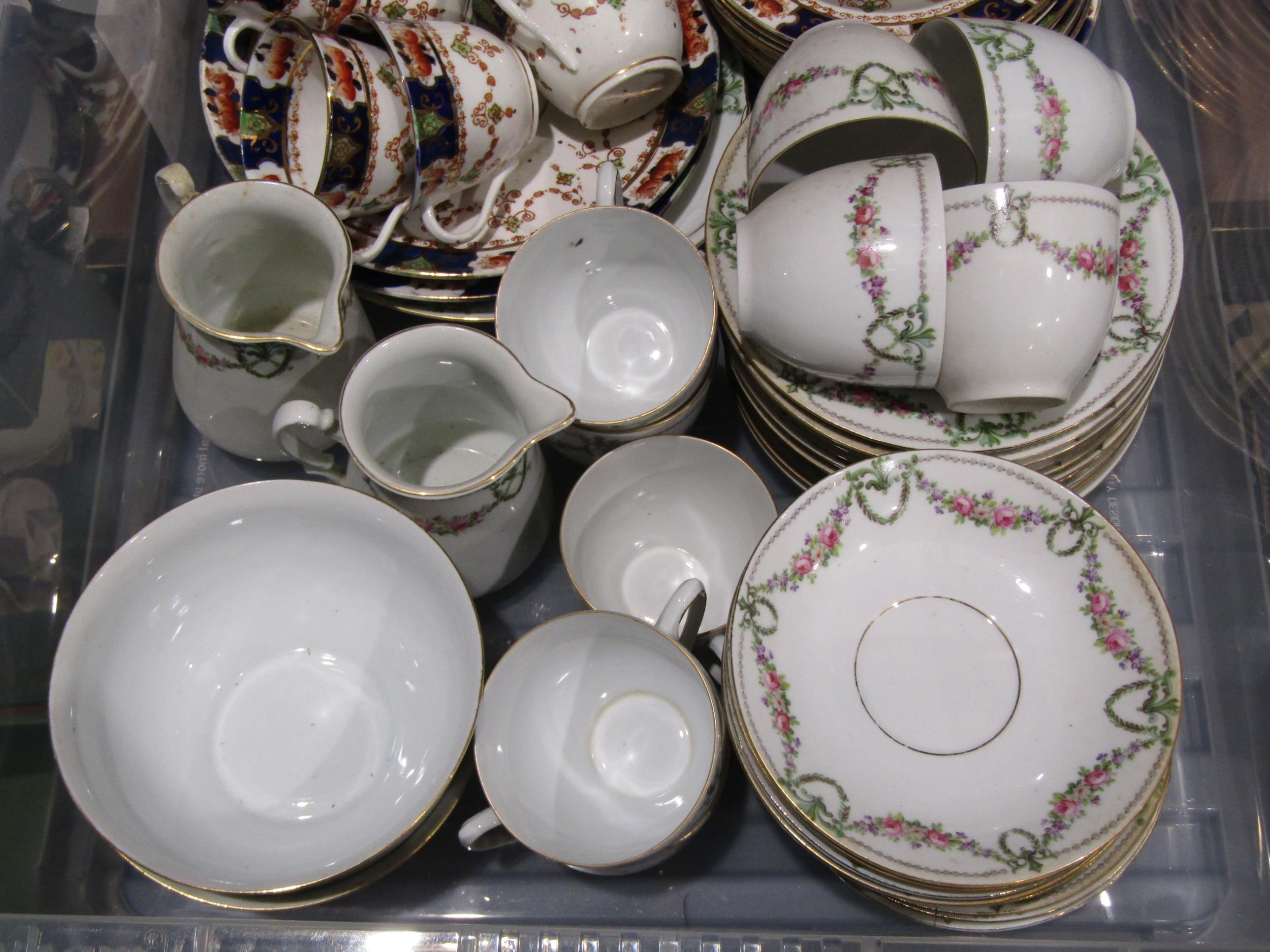 A Newhall style tea set and an imari palette tea set
