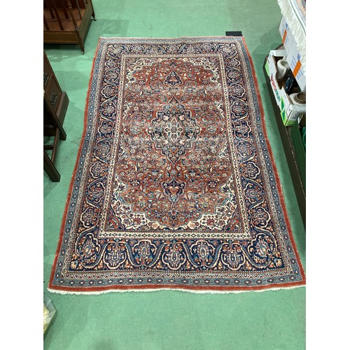 4513 - A small silk carpet, red ground, multiple borders, worn, 214cm x 132cm