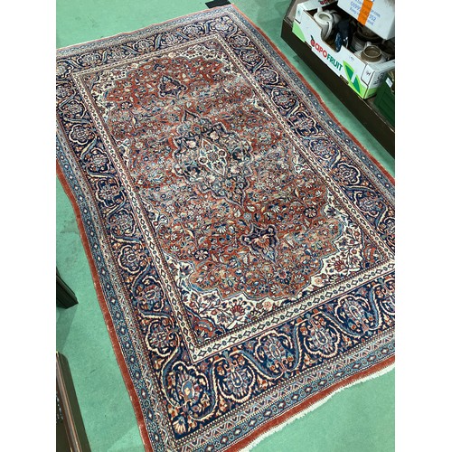 4513 - A small silk carpet, red ground, multiple borders, worn, 214cm x 132cm
