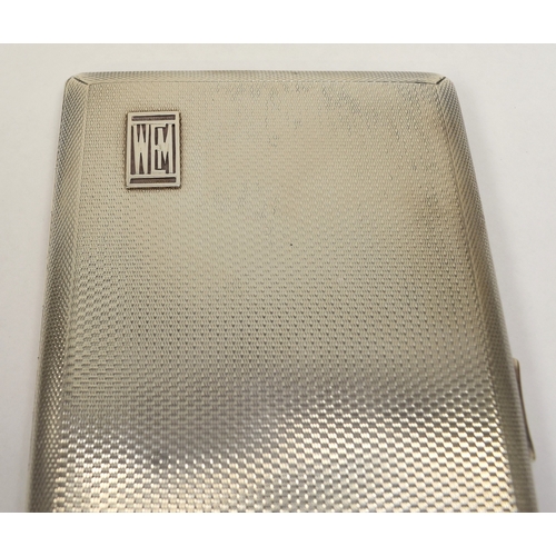 8051 - A Goldsmith and Silversmith silver cigarette case, monogrammed WEM, London 1932, 15cm long, 8.5cm wi... 