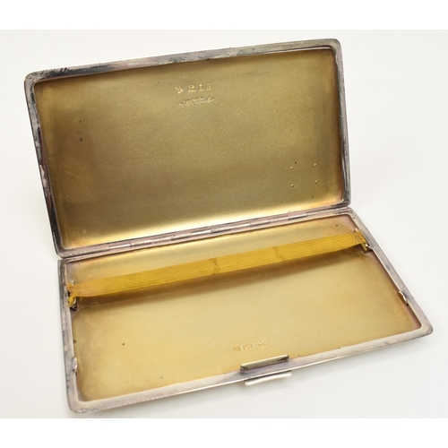 8051 - A Goldsmith and Silversmith silver cigarette case, monogrammed WEM, London 1932, 15cm long, 8.5cm wi... 