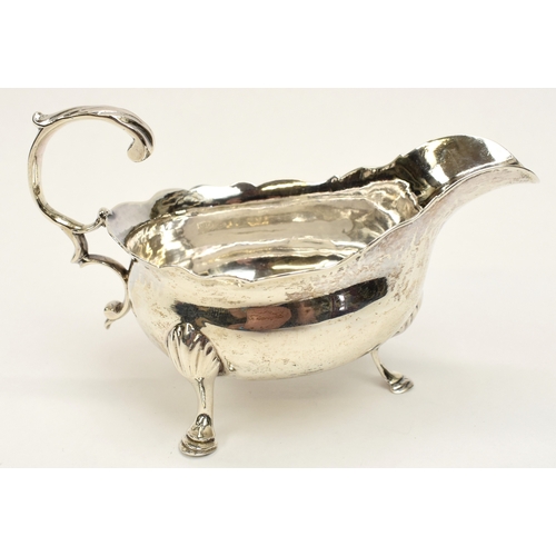 8028 - A Stephen Adams I, Stephen Adams II George III silver sauce boat/cream jug, London 1767, monogram EC... 