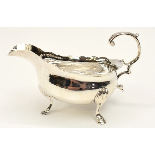 8028 - A Stephen Adams I, Stephen Adams II George III silver sauce boat/cream jug, London 1767, monogram EC... 