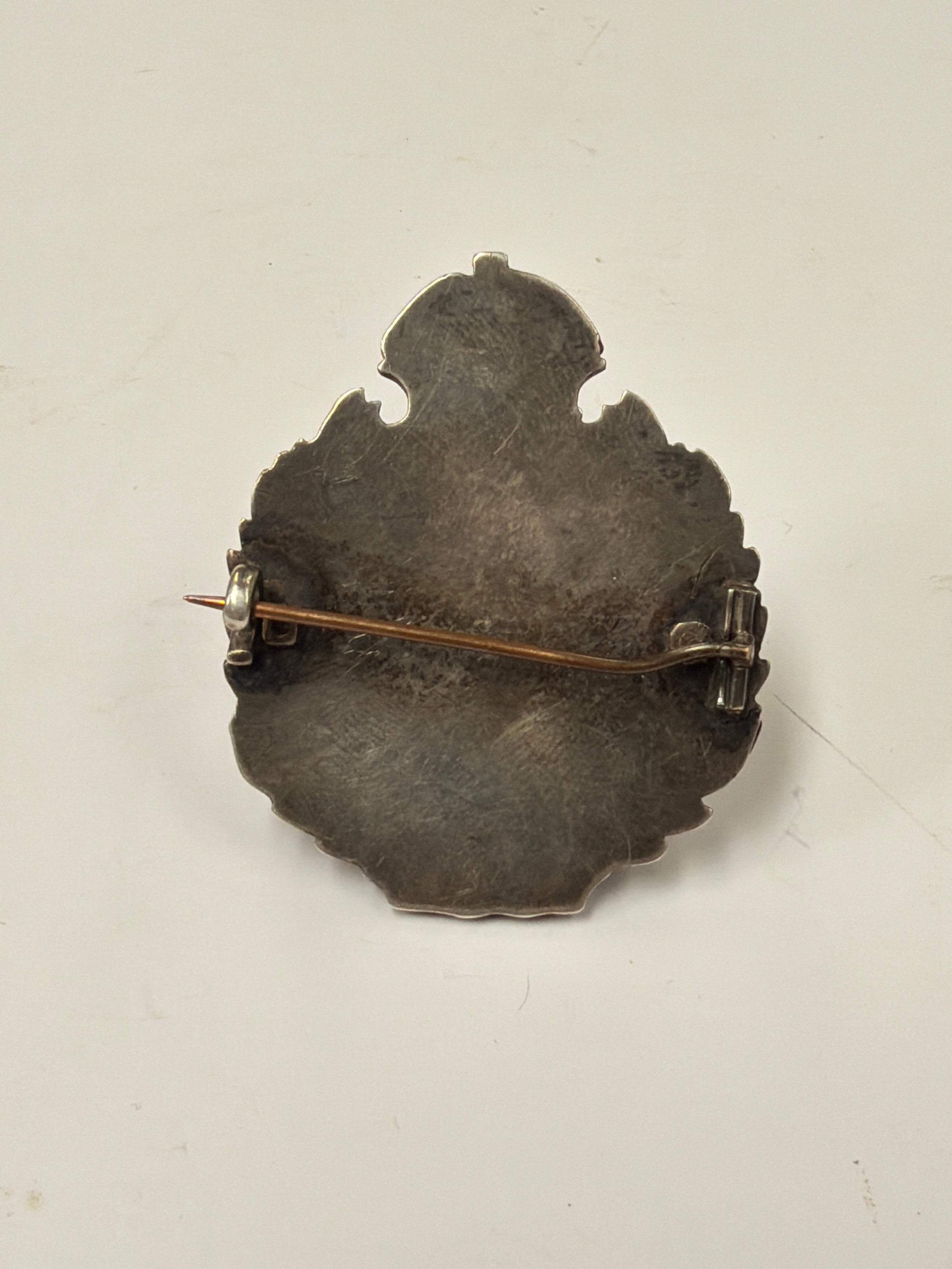 A Victorian Rifle Brigade officer's badge, solid white metal, the crown ...