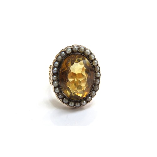 6043 - An unmarked gold citrine and seed pearl cluster ring in Georgian style, resized. Size O, 6.9g