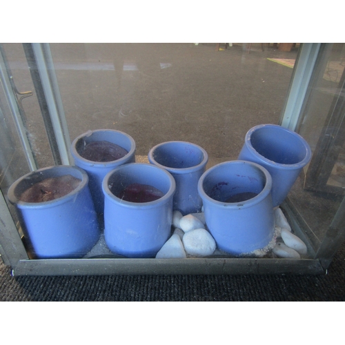 1001 - A chrome rectangular lantern with six candles and a pair of chrome lantern glass panels, loop handle... 