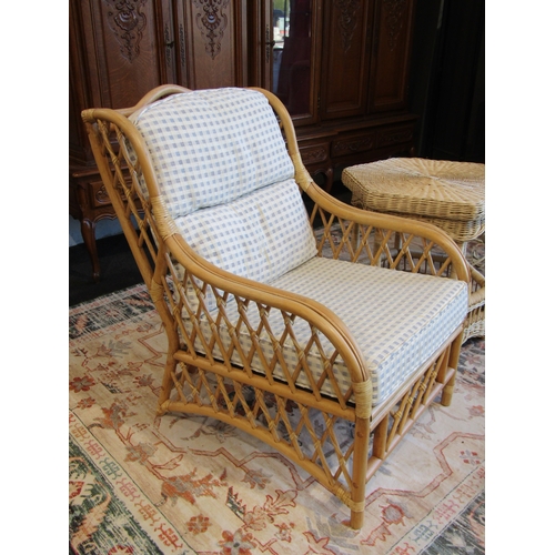 1014 - A cane armchair and cane hexagonal occasional table (2)