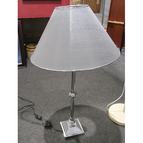 1037 - A cream painted floral design standard lamp and a table lamp on stepped base (2)