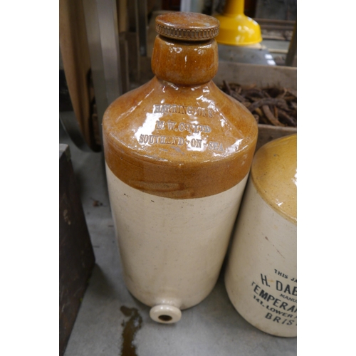 2041 - Three stoneware flagons, Whyte way Devon cider, H.Dabinett &co etc