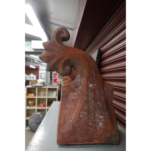 2047 - A terracotta roof finial