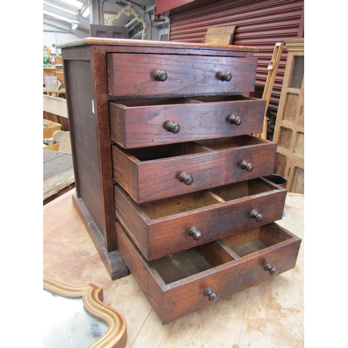 2005 - A Victorian table top chest of drawers in oak, five drawers, sectional interior to each, 48cm tall x... 