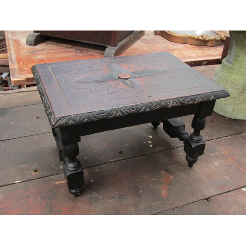 2017 - A Victorian oak rectangular stool, carved top on turned supports