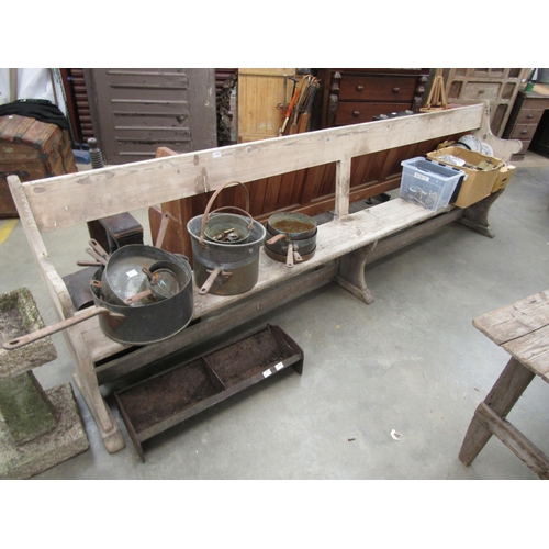 2027 - A large church pine pew, 318cm long