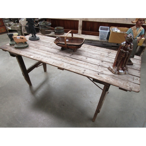 2030 - A pine tresle table, 182cm x 67cm