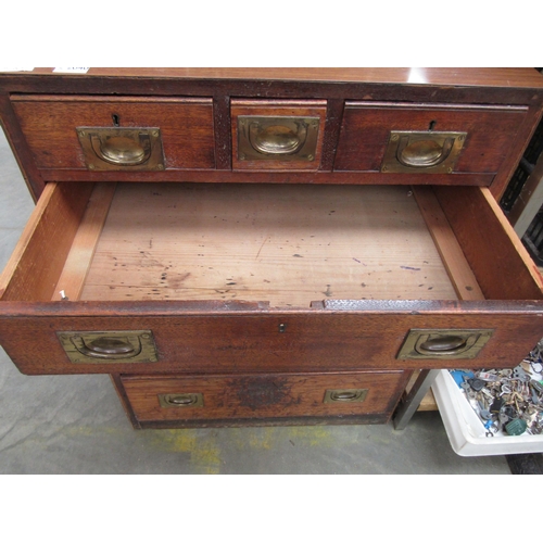 2040 - A campaign style chest of three short over four long drawers, brass inset handles, later top, 68.5cm... 