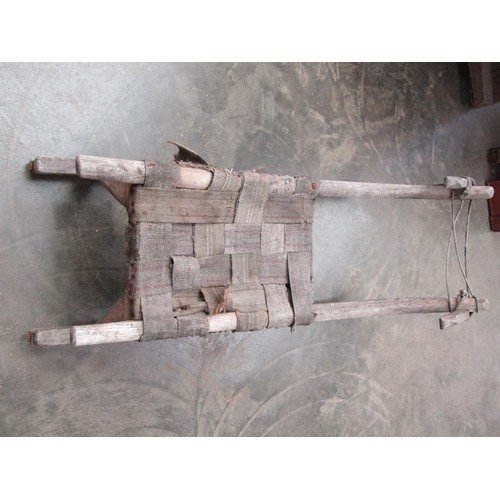 2012 - A Scandinavian vintage sledge, canvas woven seat, metal runners
