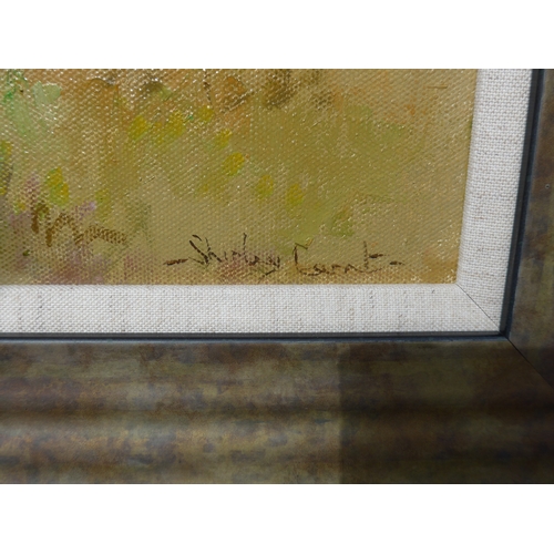9047 - SHIRLEY CARNT (b.1927) A large framed oil on canvas, figure walking dog in woodland landscape. Signe... 
