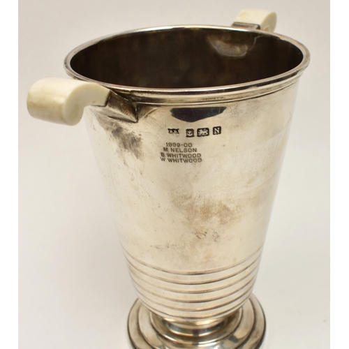 8007 - A silver presentation wine cooler ice bucket of Deco form by Barker Brothers Silver Ltd., Bakelite h... 