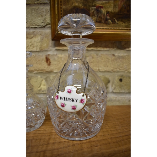 4408 - A Stuart Crystal ring necked decanter, a crystal decanter with ceramic whisky label and a small Stua... 