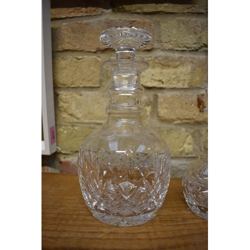 4408 - A Stuart Crystal ring necked decanter, a crystal decanter with ceramic whisky label and a small Stua... 