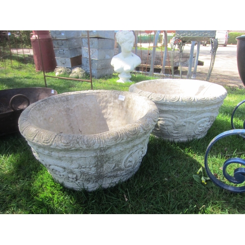 5065 - A pair of round composition decorative planters, 57cm diameter x 29cm tall