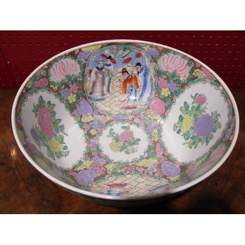 4025 - A Chinese Canton famille rose bowl, 31cm diameter