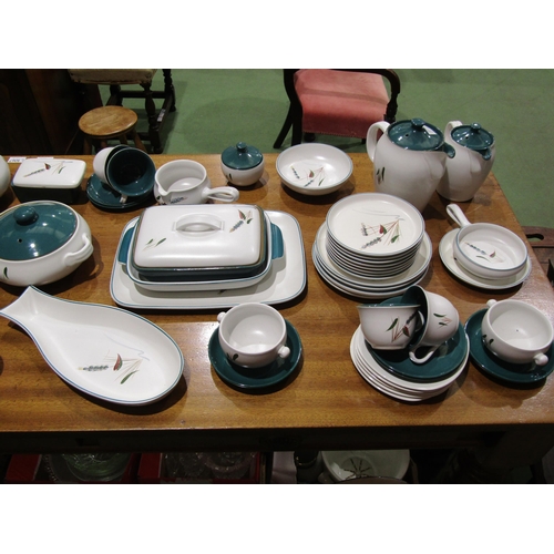 4064 - A quantity of Denby Greenwheat tablewares to include dinner plates, tureens, teapots, oven dishes et... 