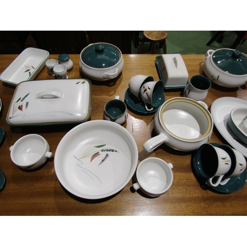 4064 - A quantity of Denby Greenwheat tablewares to include dinner plates, tureens, teapots, oven dishes et... 