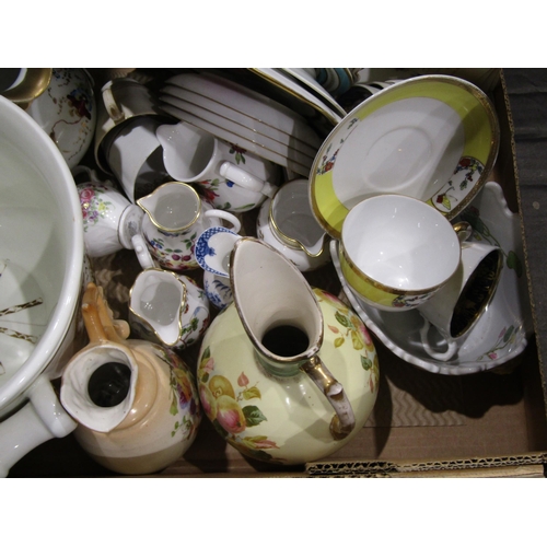 4069 - A box of ceramics including a Worcester blush style ewer, a planter 
