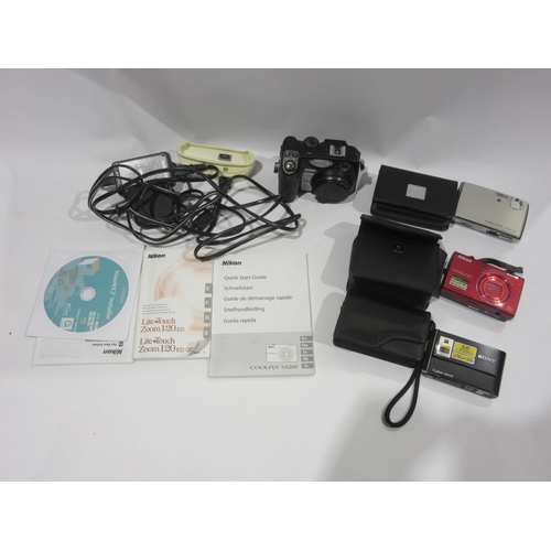 4217 - A collection of digital compact cameras including Nikon Coolpix 5400 and Sony Cybershot, some with c... 