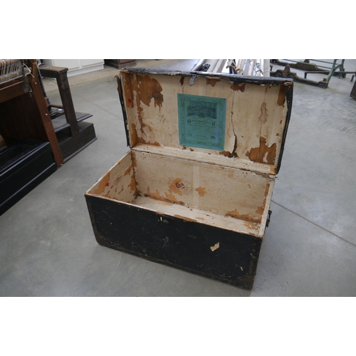 2060 - A Victorian pine metal bound trunk with iron handles