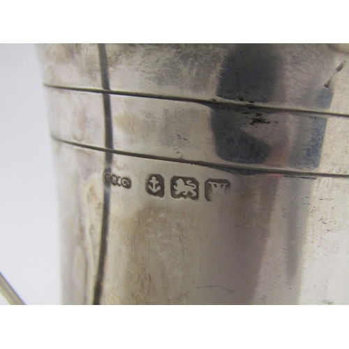 4338 - A silver cup engraved 