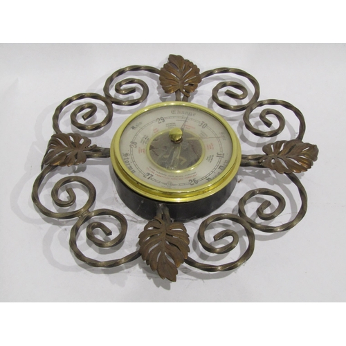 4388 - A collection of horse brasses, a barometer and brass dustpan and brush